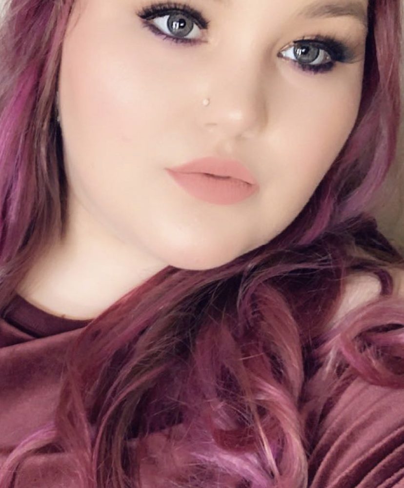 Marissa with purple-streaked hair